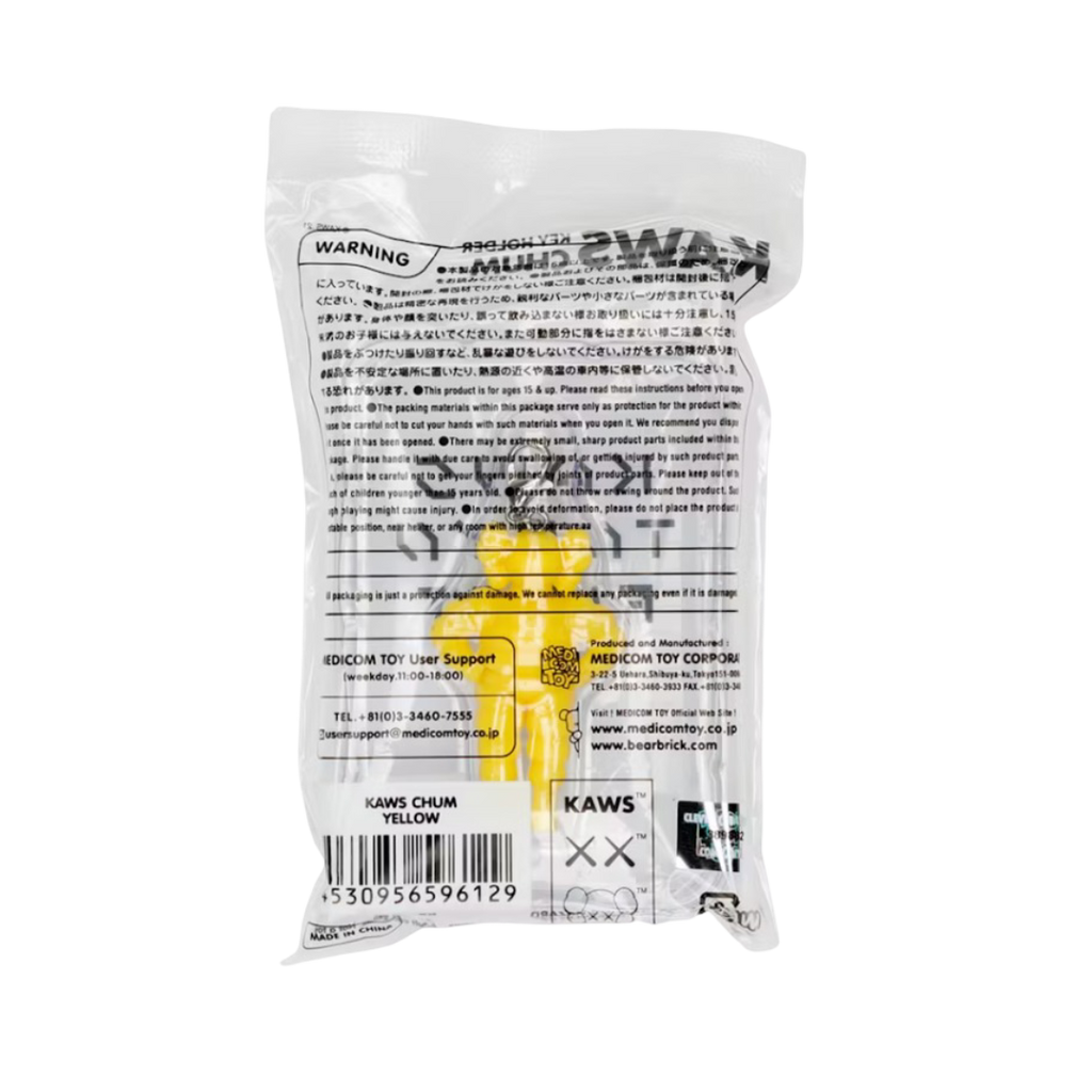 Llavero amarillo KAWS Tokyo First Chum
