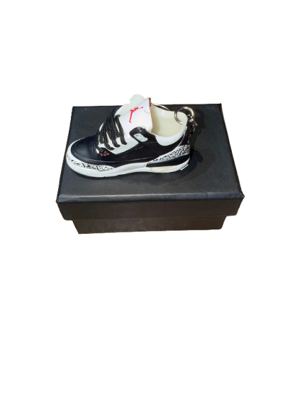 Llavero coleccionable de zapatillas